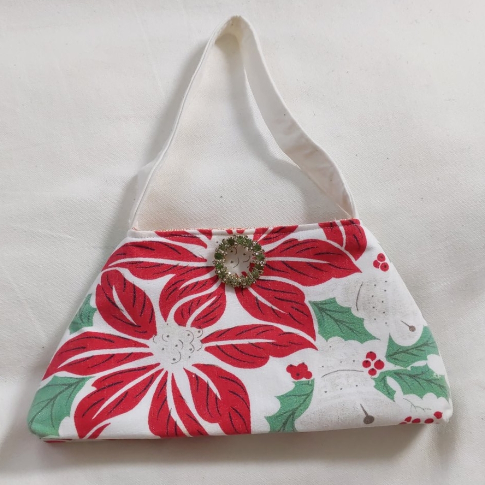 Like new holiday purse with vintage brooch accent